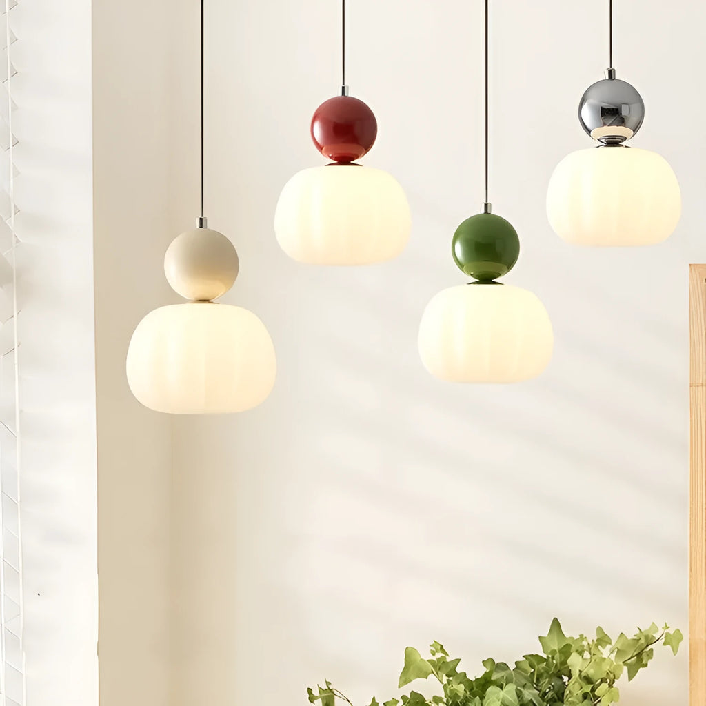 Creative alloy pumpkin chandelier light fixture for ceiling mounting in cream, red, green, chrome, or walnut finish.
