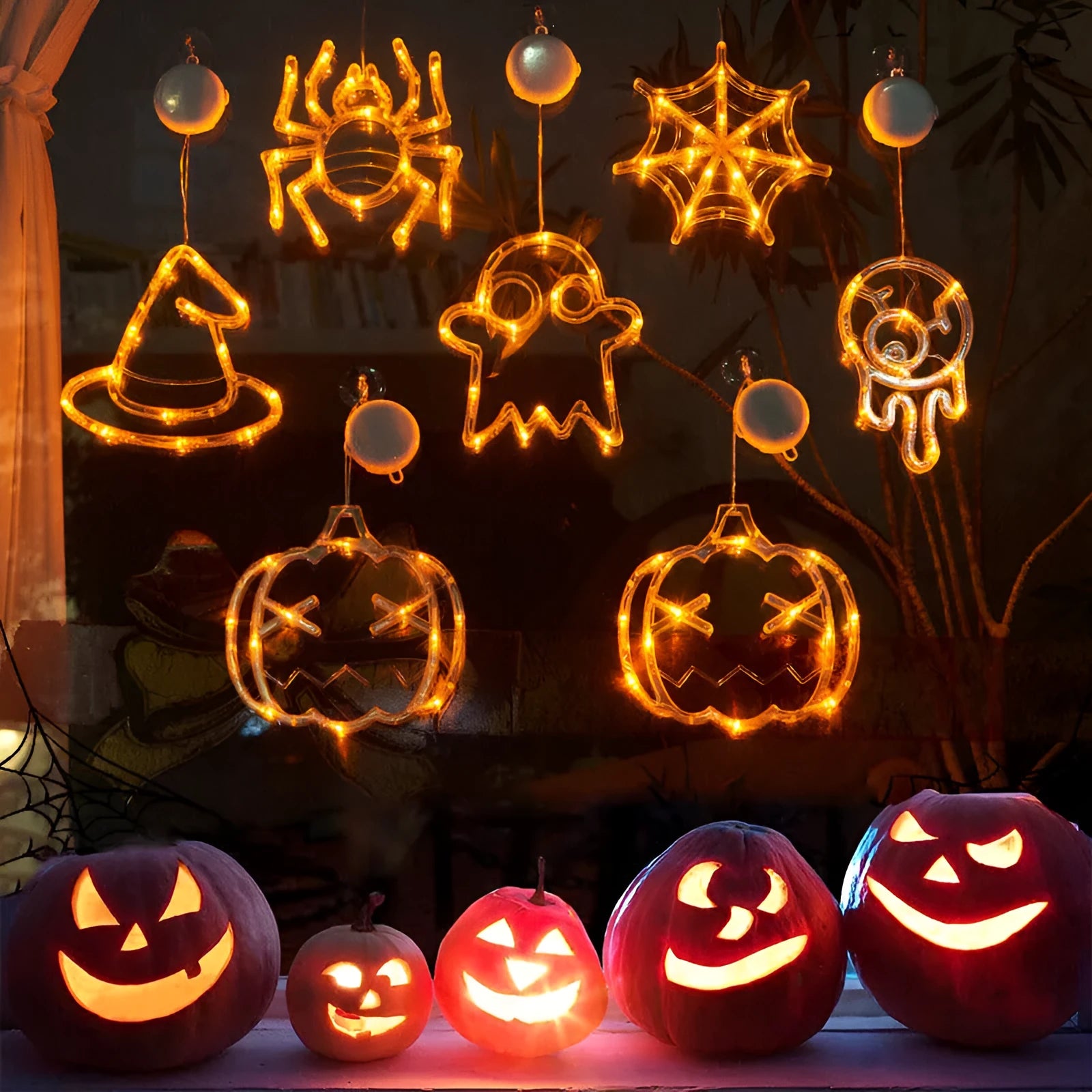 Halloween window hanging LED lights set with seven battery-powered horror-themed decorative pieces