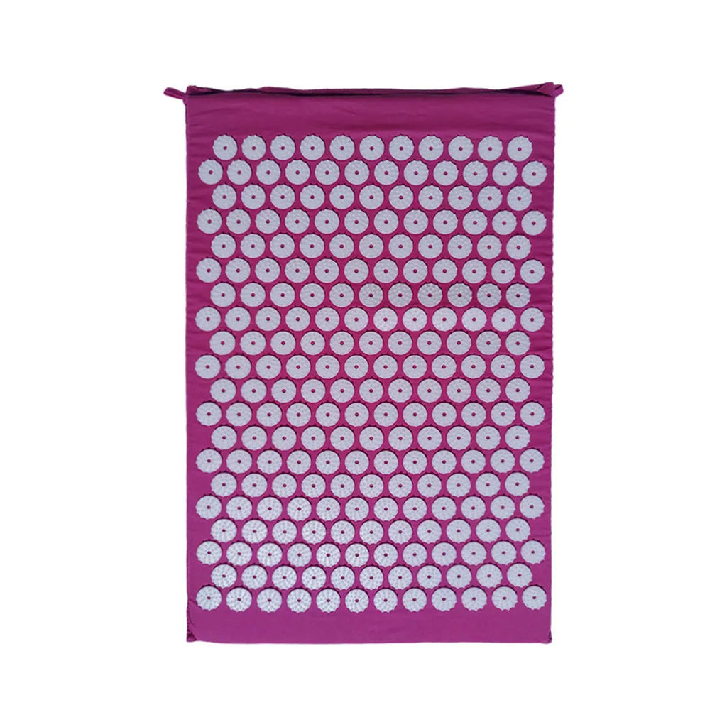 Black and blue acupuncture massage mat set with cushion and headrest on floor for yoga and massage