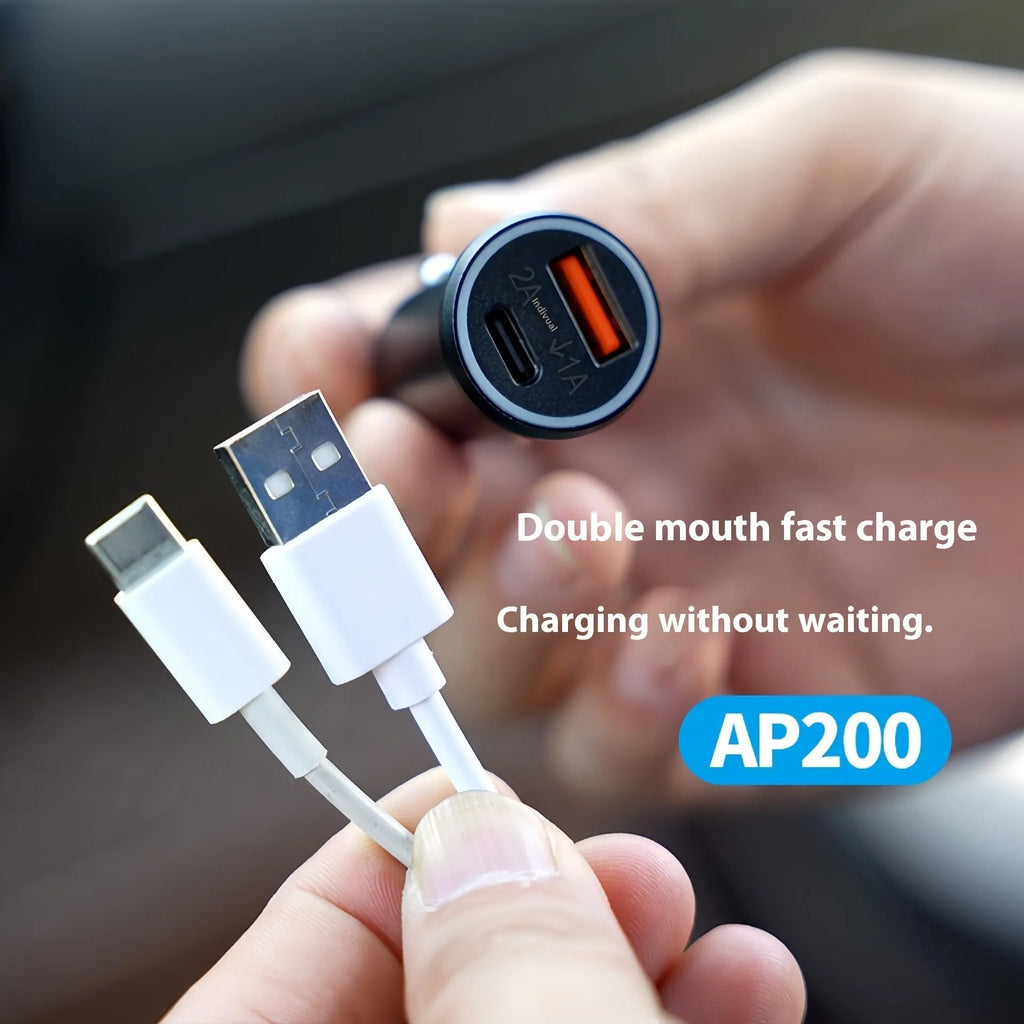 Black plug-in GPS car tracker with magnetic base, shown inserted into a vehicle's 12V lighter socket.