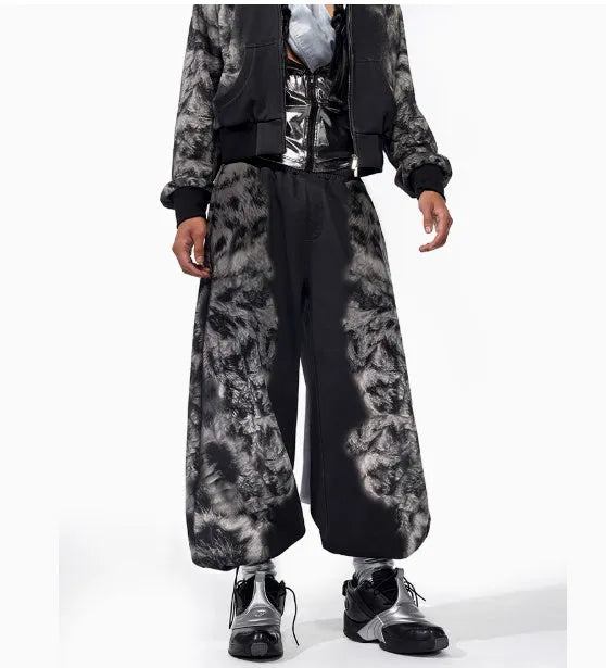 Women's grey printed hoodie, matching loose trousers, and seven-inch shorts laid flat as a three-piece co-ord set.