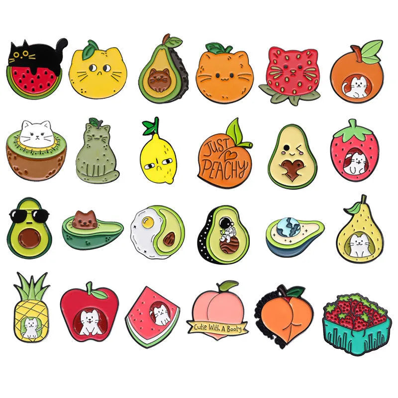 Colourful cartoon-style fruit metal brooch with pin back on a denim jacket lapel.