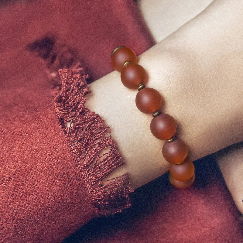 Retro ethnic style couples bracelet made from natural green and red agate stones on a sizing chart showing 15, 16, 17, 18 yard options.