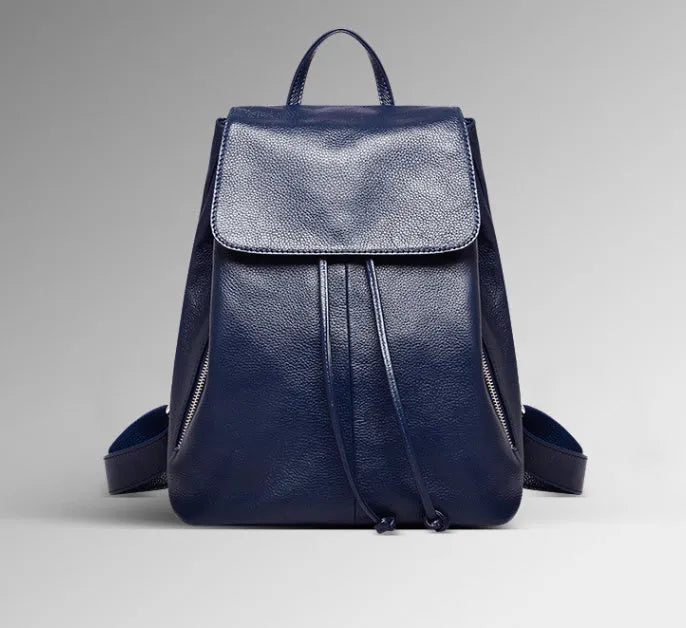 Soft black genuine leather women's backpack in Korean street trend style, showing multiple internal compartments.