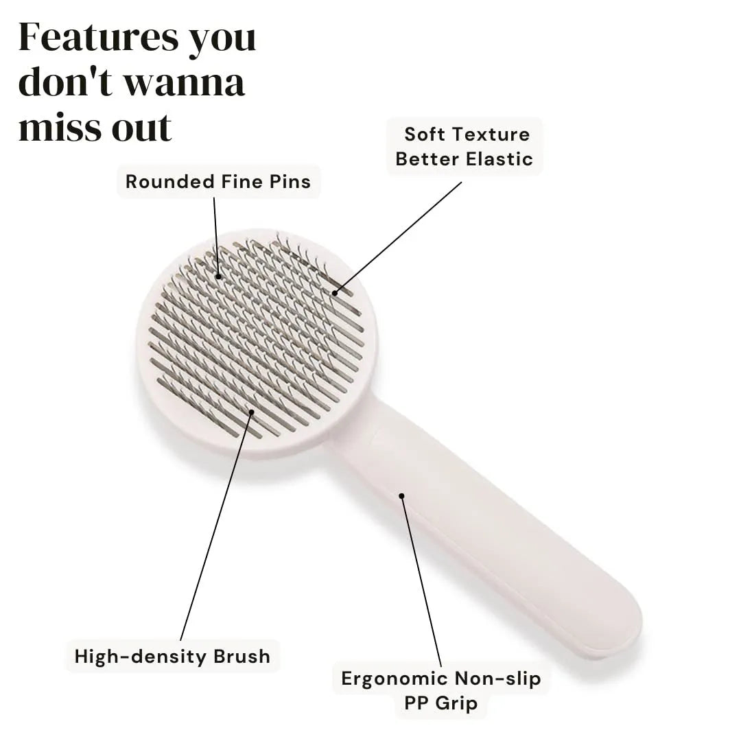 Self-cleaning pet grooming brush with ergonomic handle in blue, grey, or pink