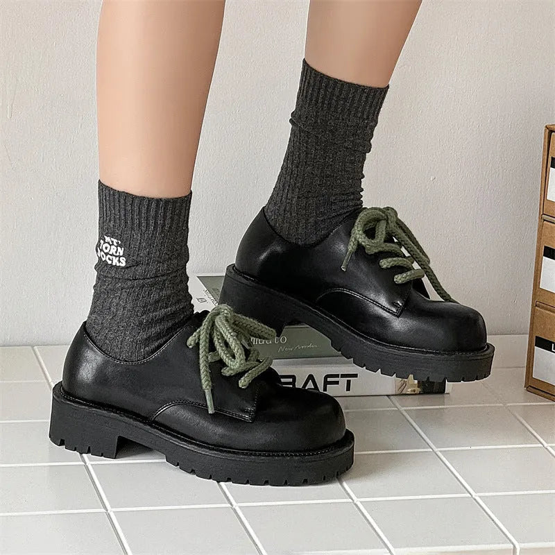 Big Head derby style platform shoes with rubber sole and microfiber upper, shown in casual style.