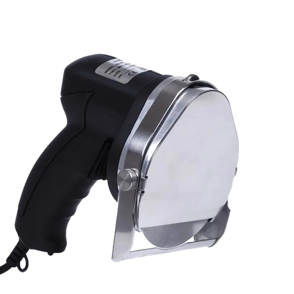 Black KS-100E electric meat cleaver appliance on a counter, showing its blade and compact 150x200x270mm body.