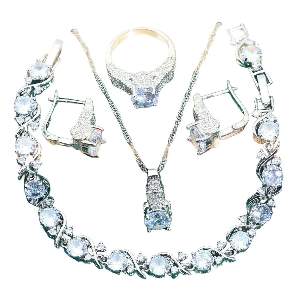 Bridal zircon necklace, bracelet, earrings, and ring four-piece jewellery set in alloy.