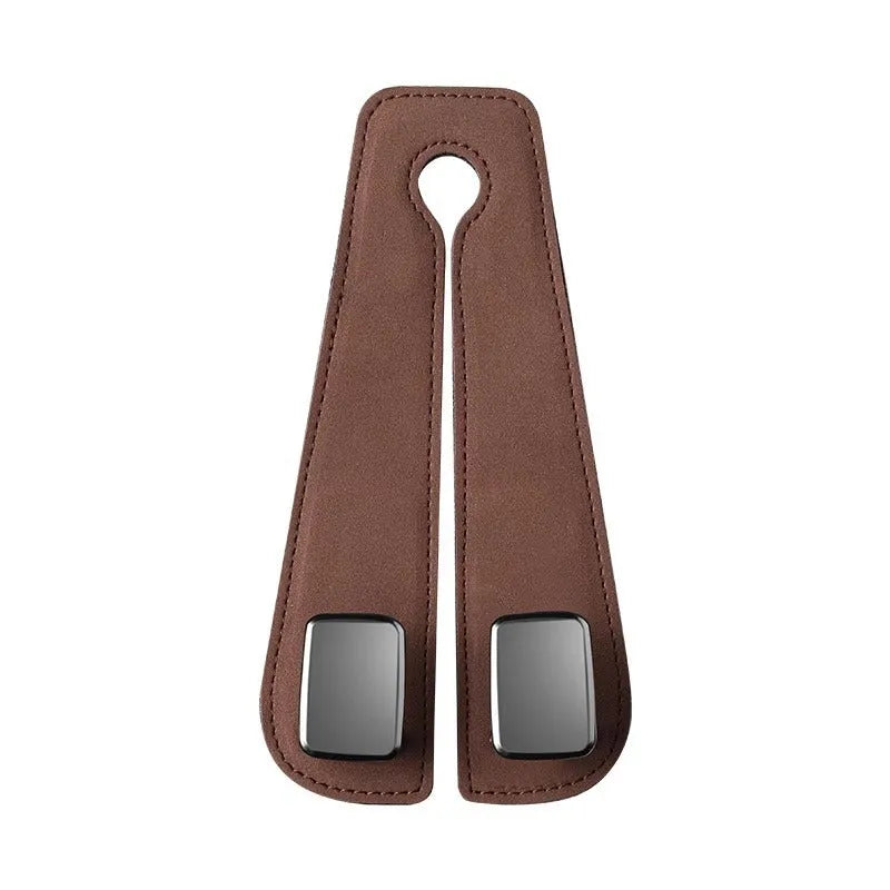 Alloy car seat hook storage bag in black suede fabric shown flipped open and closed on car headrest