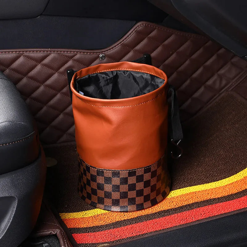 Leather retractable folding car trash can with handle, shown in vehicle interior