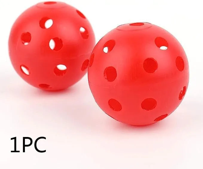Multi-colour golf practice balls in red, orange, blue, green, white, and yellow shown in a net bag.
