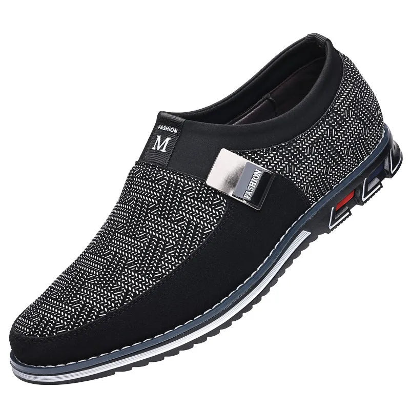 Men's grey and white synthetic leather slip-on casual shoes with a square toe and flat rubber sole.