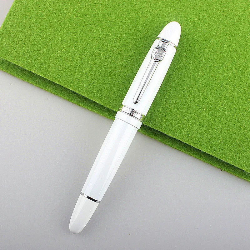 Metal ball pen with pearl round beads and black gold clip on white background