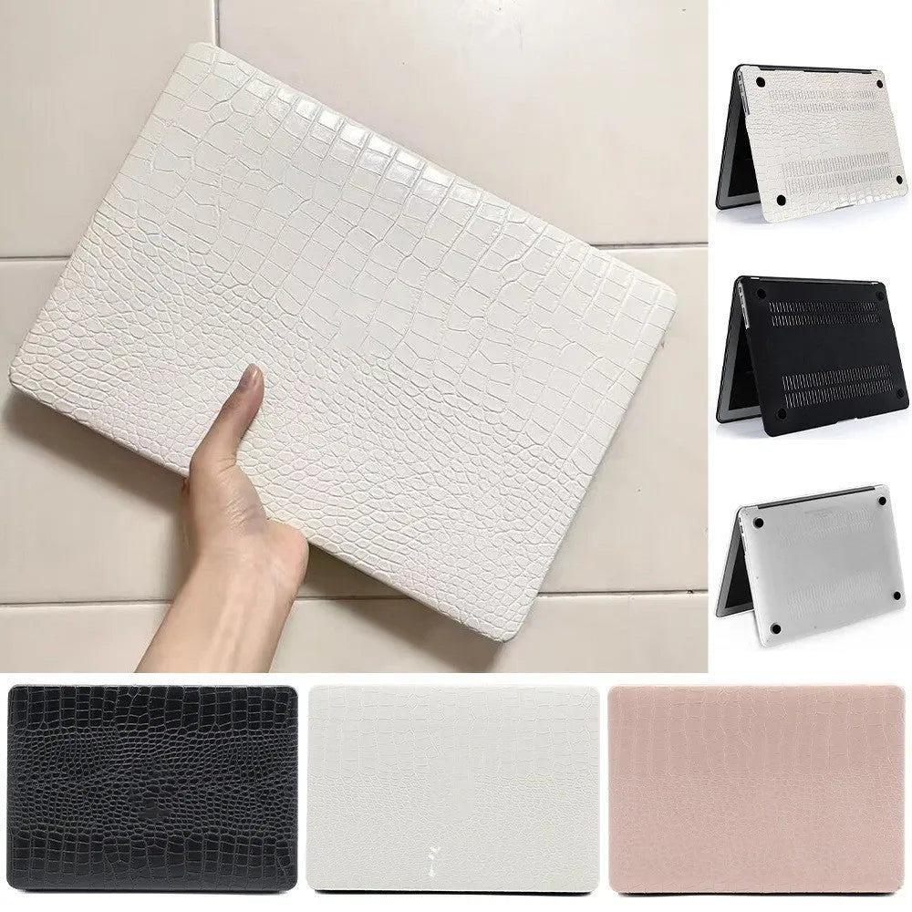MacBook laptop case in soft pink with a textured crocodile pattern and a hollowed-out Apple logo on the lid.