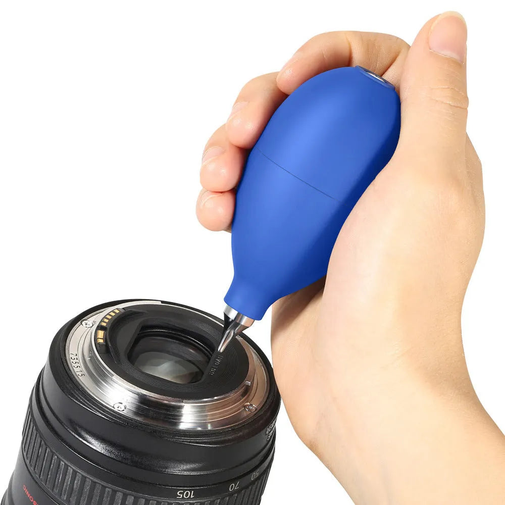 Blue rubber handheld dust blower cleaning tool for cameras and mobile phones.