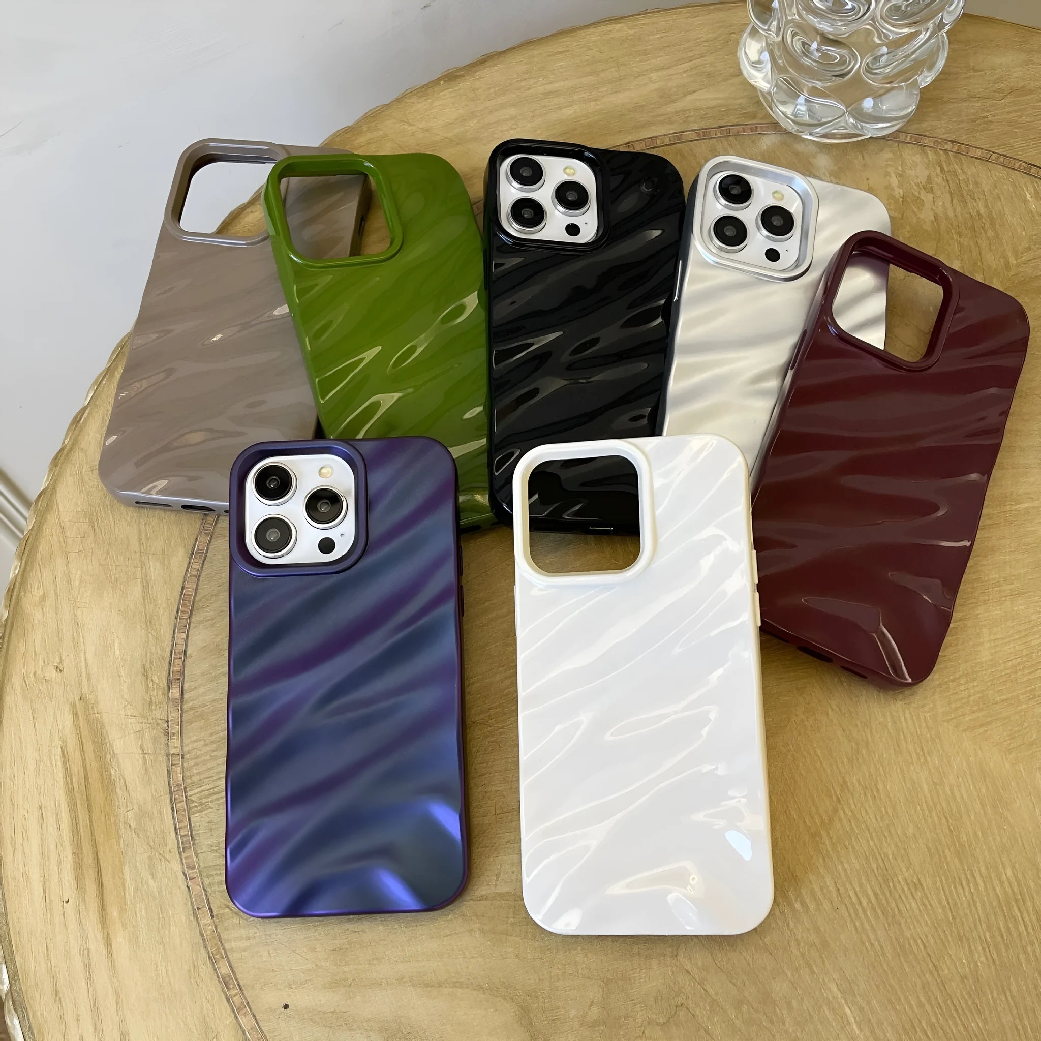 Soft textured wave pleated TPU phone case for Apple iPhone 17 models in a burgundy colour
