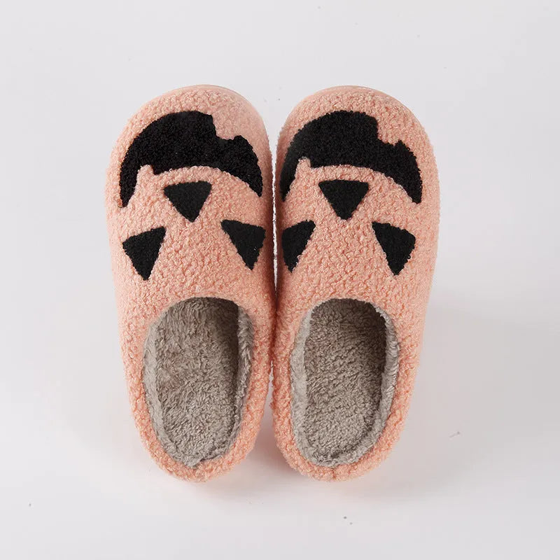 Halloween pumpkin cartoon thermal winter cotton slippers with suede upper, non-slip TPR sole, available in black and watermelon red