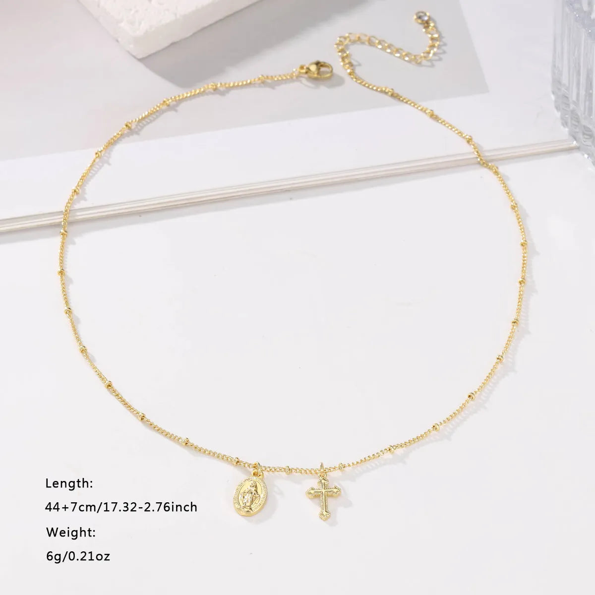 Gold geometric cross Virgin Mary necklace for women on copper chain