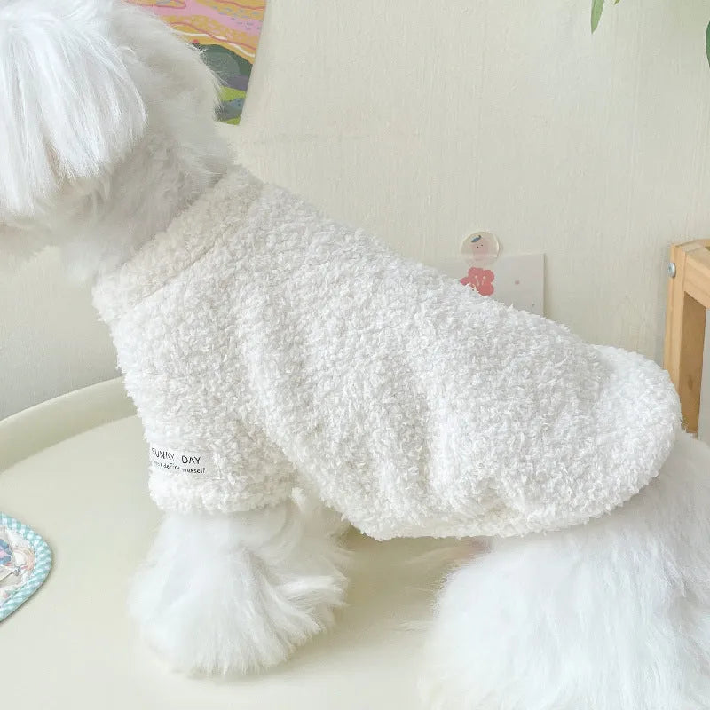 Double-sided cloud velvet pet clothes for small dogs or cats in various colours and sizes.