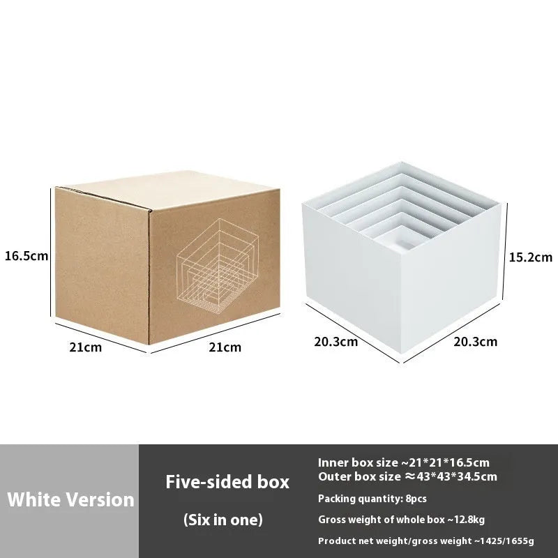 Set of six white plastic dessert display stands arranged on a tabletop.