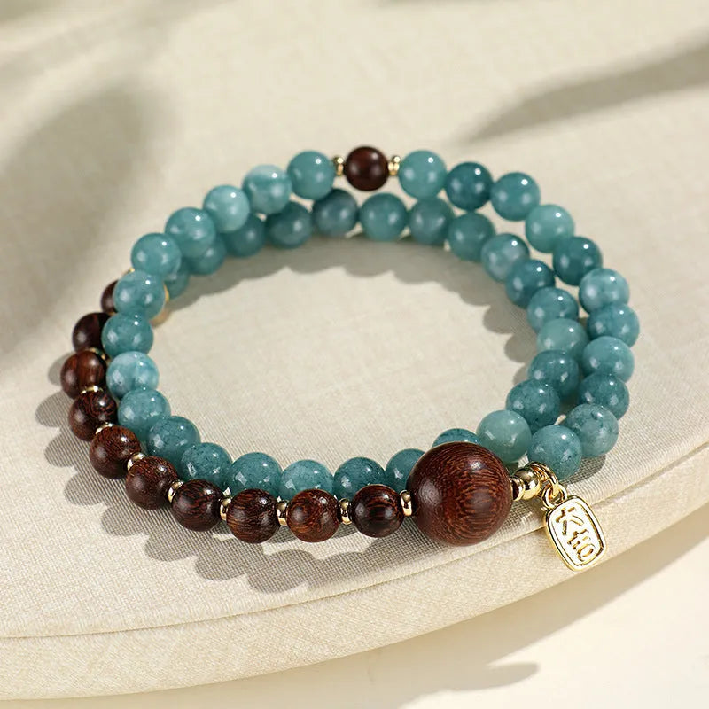 Blue New Chinese style beaded bracelet for women with Fu and Xi characters.