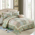 Washed pure cotton quilted bedspread and pillowcases in a beige colour, showing textured fabric.
