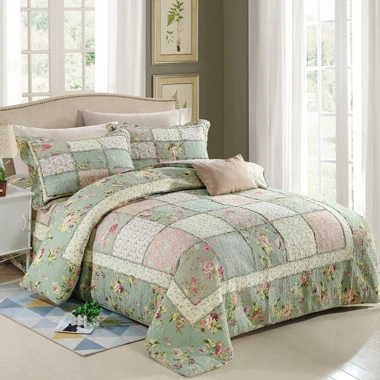 Washed pure cotton quilted bedspread and pillowcases in a beige colour, showing textured fabric.