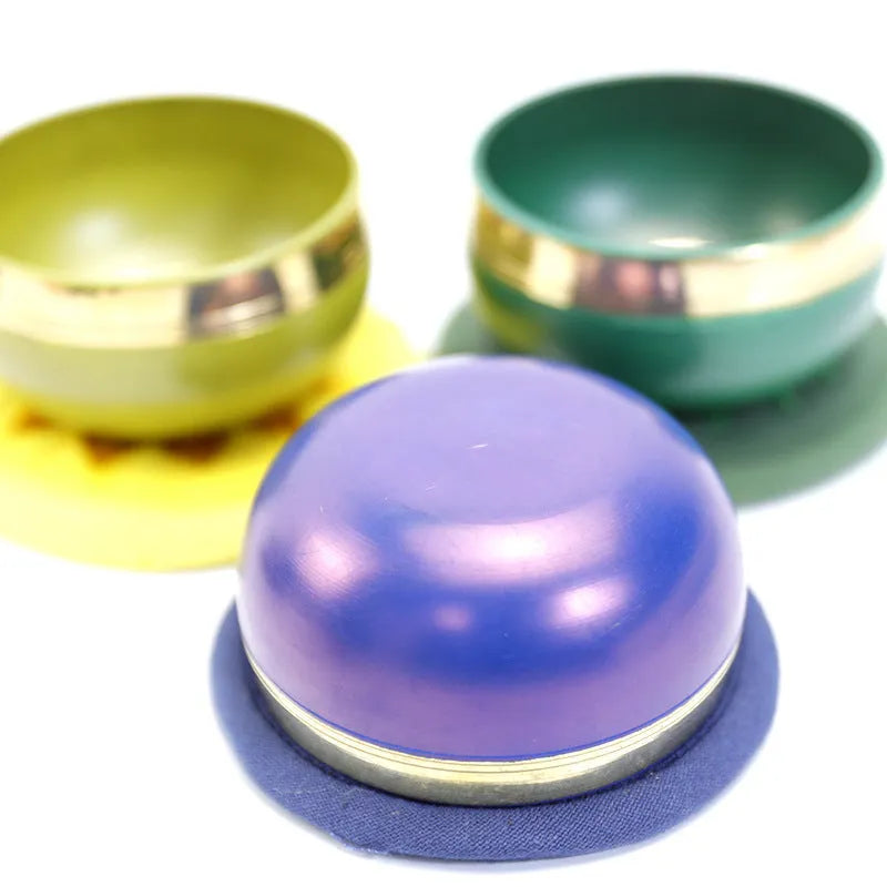 Handmade colourful Himalayan singing bowl percussion instrument with mallet for meditation and yoga