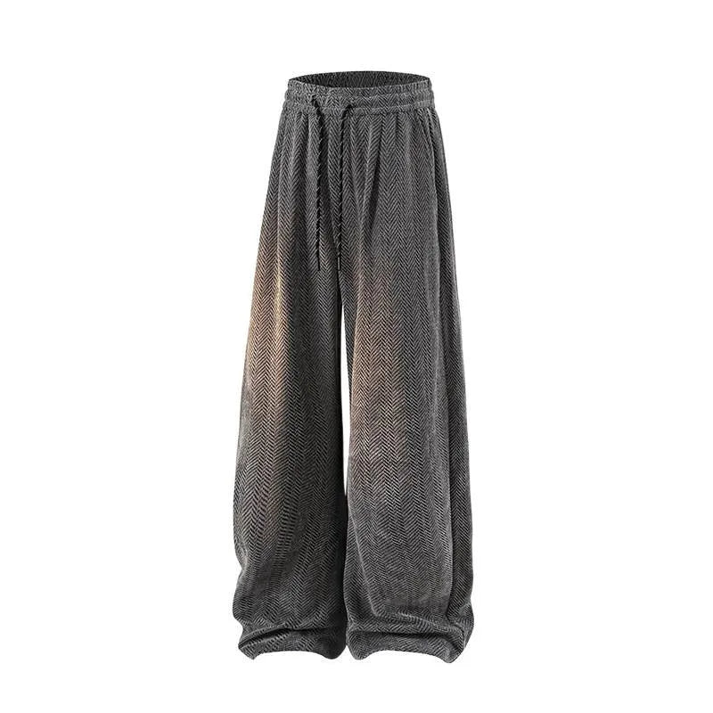 Man's grey straight-leg hollow-out casual trousers with elastic waist, shown in a plus size fit