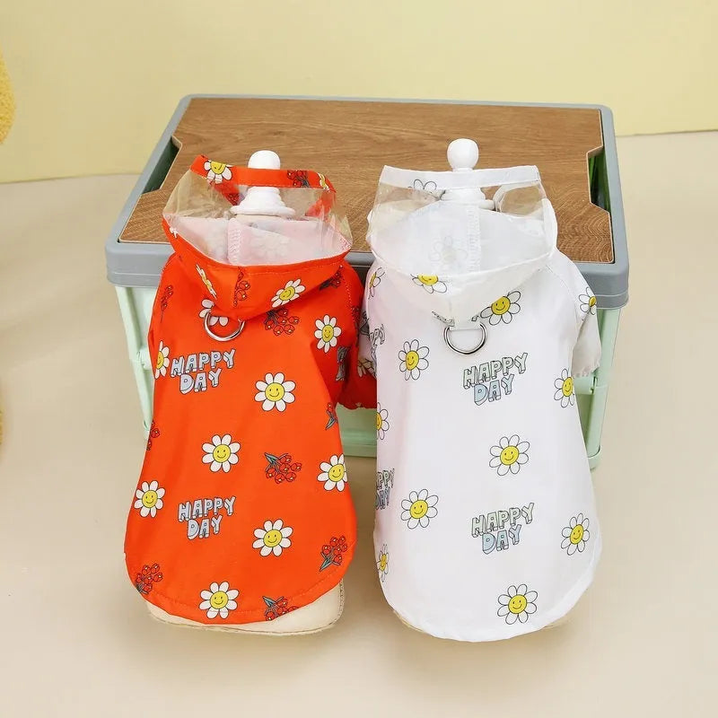 Transparent dog raincoat with small flower print and pull ring traction system