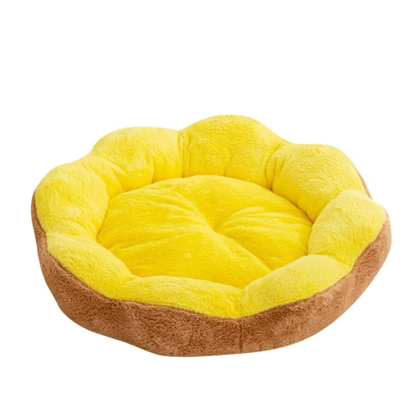 Round plush cat bed with detachable inner nest in grey and black, showing raised sides and soft texture.