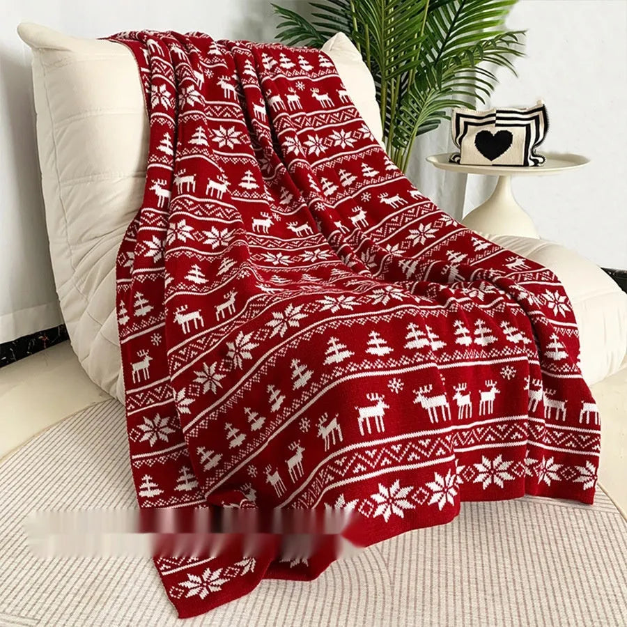 Personalised Christmas themed acrylic blanket with snowflake or reindeer pattern in two size options.