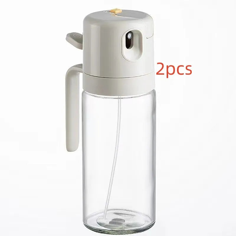 Warm grey glass oil sprayer bottle with switchable cover for spray and pour modes