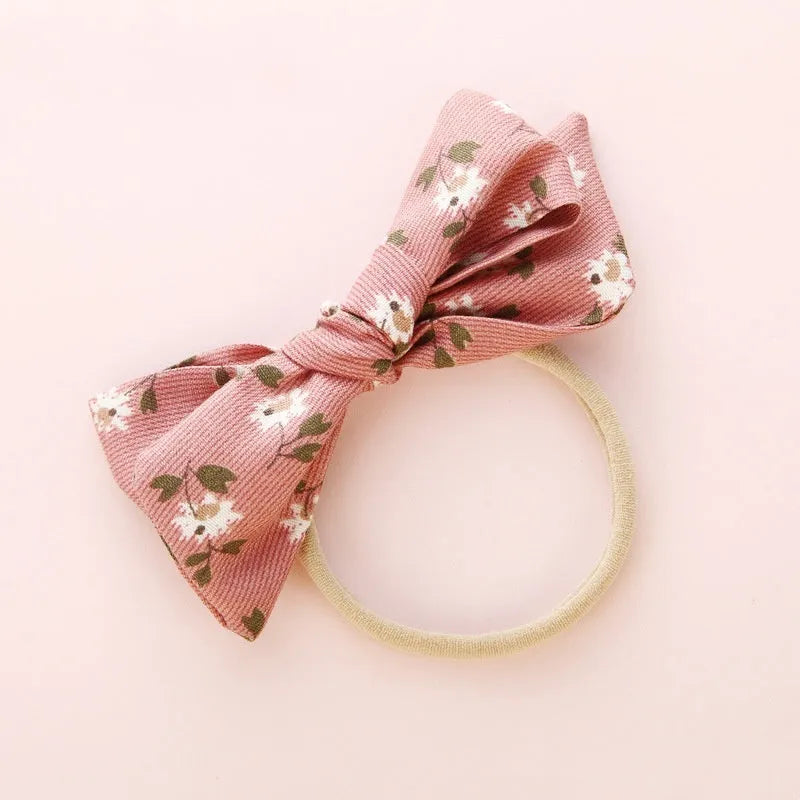 Children's knotted bow hair ring in cloth with Princess series styling