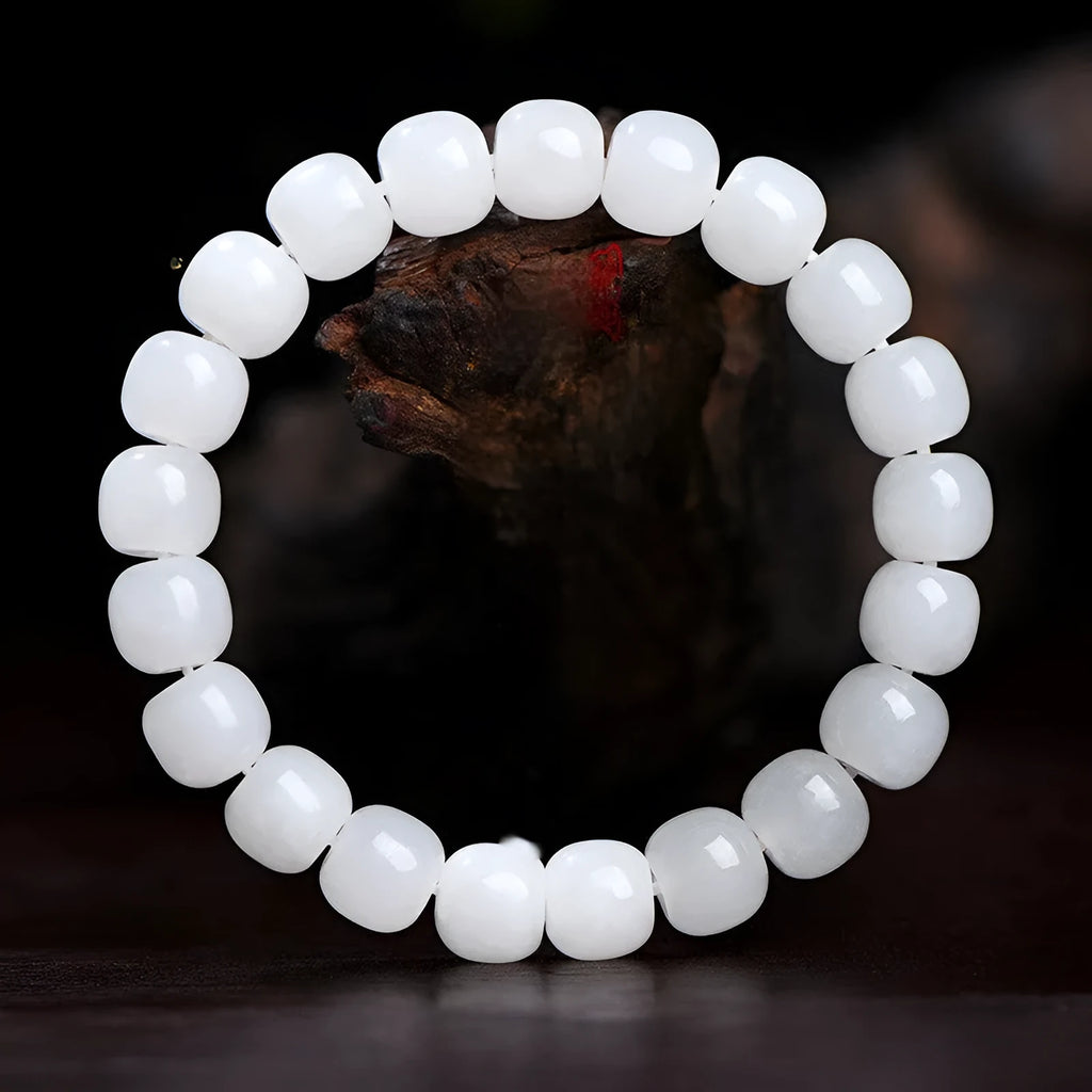 White Hetian jade barrel bead bracelet for men and women showing bead size options.