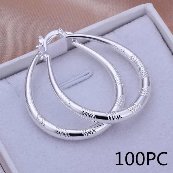 Creative silver tone hoop earrings with copper core and 925 silver plating, 3.9cm by 3.2cm