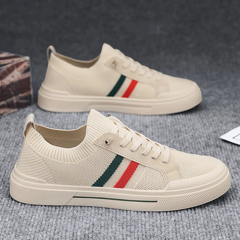 Beige men's low-top casual sneakers with mesh upper, elastic band, and flat rubber sole.