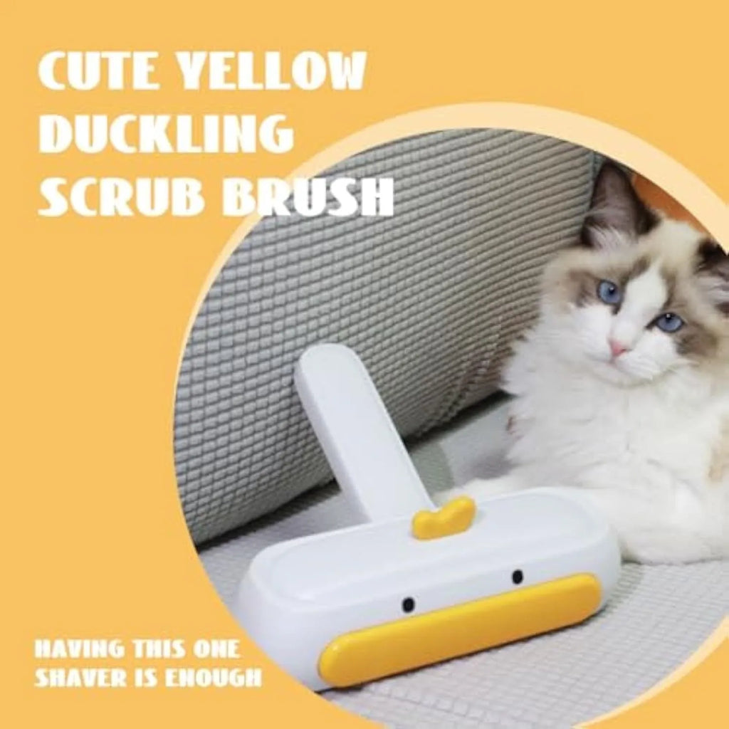 Portable pet hair remover with yellow duck design and removable lid on a fabric sofa.