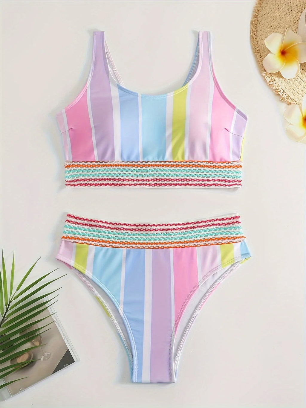 Women's striped bikini set in picture colour, showing top and briefs for swimming sports.