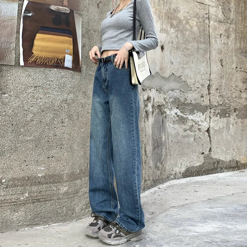 A pair of women's high-waist straight-leg jeans in a retro blue colour, shown in a cropped length.