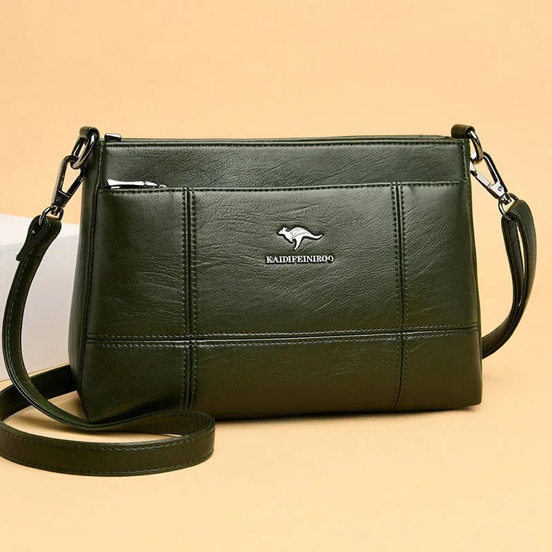 Small square sheepskin shoulder messenger bag with soft handle and double strap in solid colour
