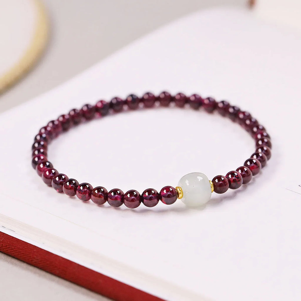 Natural garnet women's bracelet with U-shaped clasp showing 4mm and 6mm bead size options