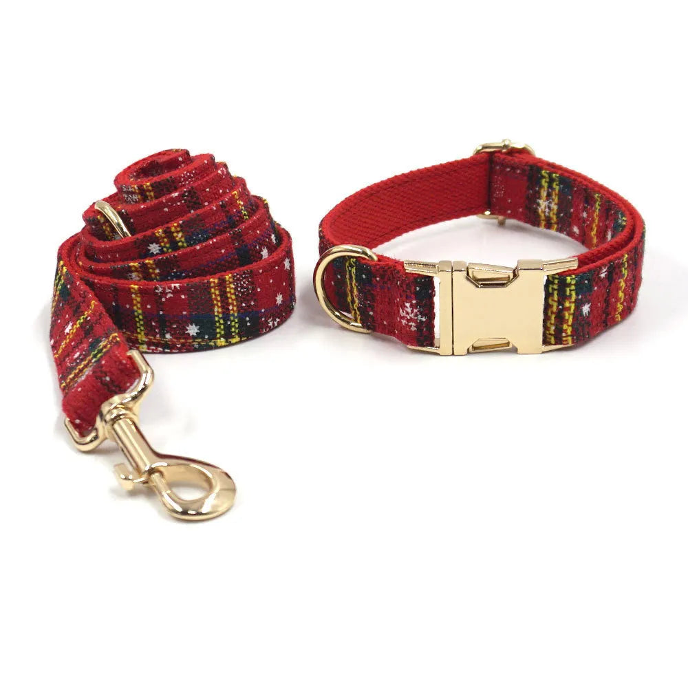 Red Christmas pet collar, leash, harness, bow, and waste bag set with laser-cut fabric design.