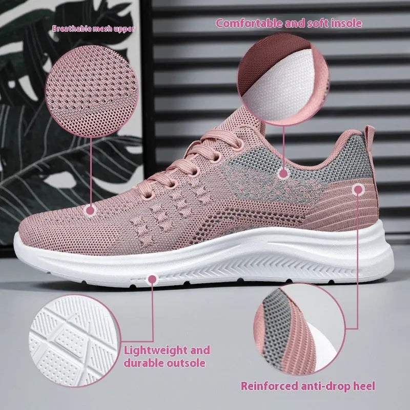 Women's low-top lace-up sneakers in black mesh with a round toe and soft PVC sole.