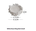 White gypsum rose ring storage tray with fabric coating, 9.5-10cm, on a flat surface