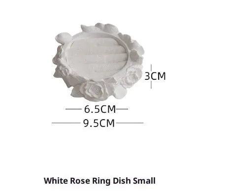 White gypsum rose ring storage tray with fabric coating, 9.5-10cm, on a flat surface