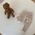 Girls' high-waist fleece-lined winter leggings in beige, black, brown, and grey with a hair band belt.