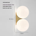 Double-headed Nordic glass ball wall lamp with gold iron finish for bedroom bedside lighting