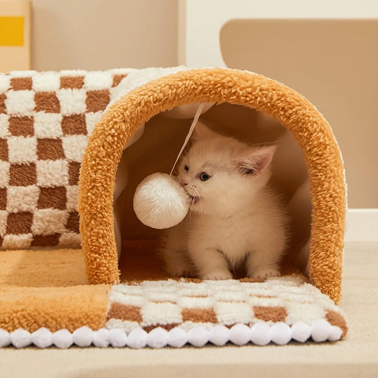 XL coffee and yellow plush 2-in-1 pet bed with a sleeping mat and attached tunnel, showing anti-slip base.
