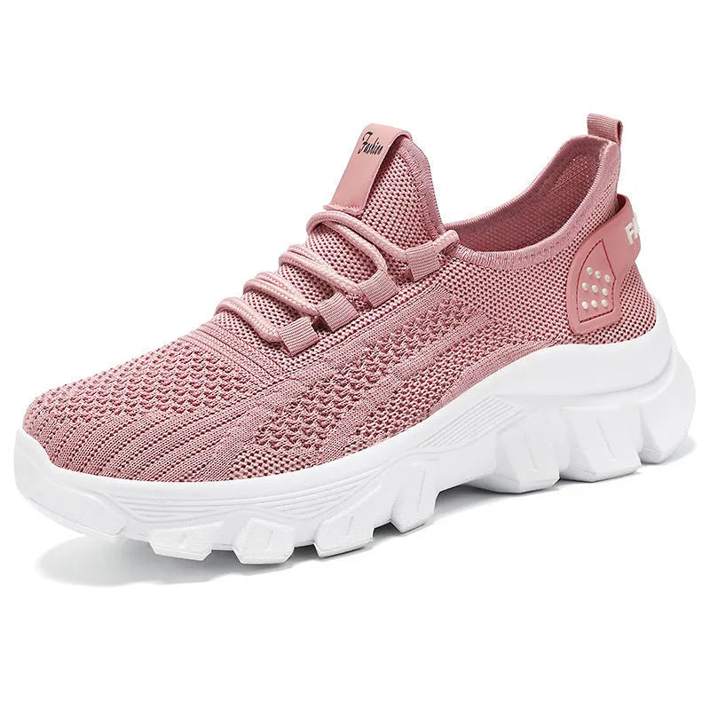 Women's Flyknit sneakers in white colour with round toe and lace-up front